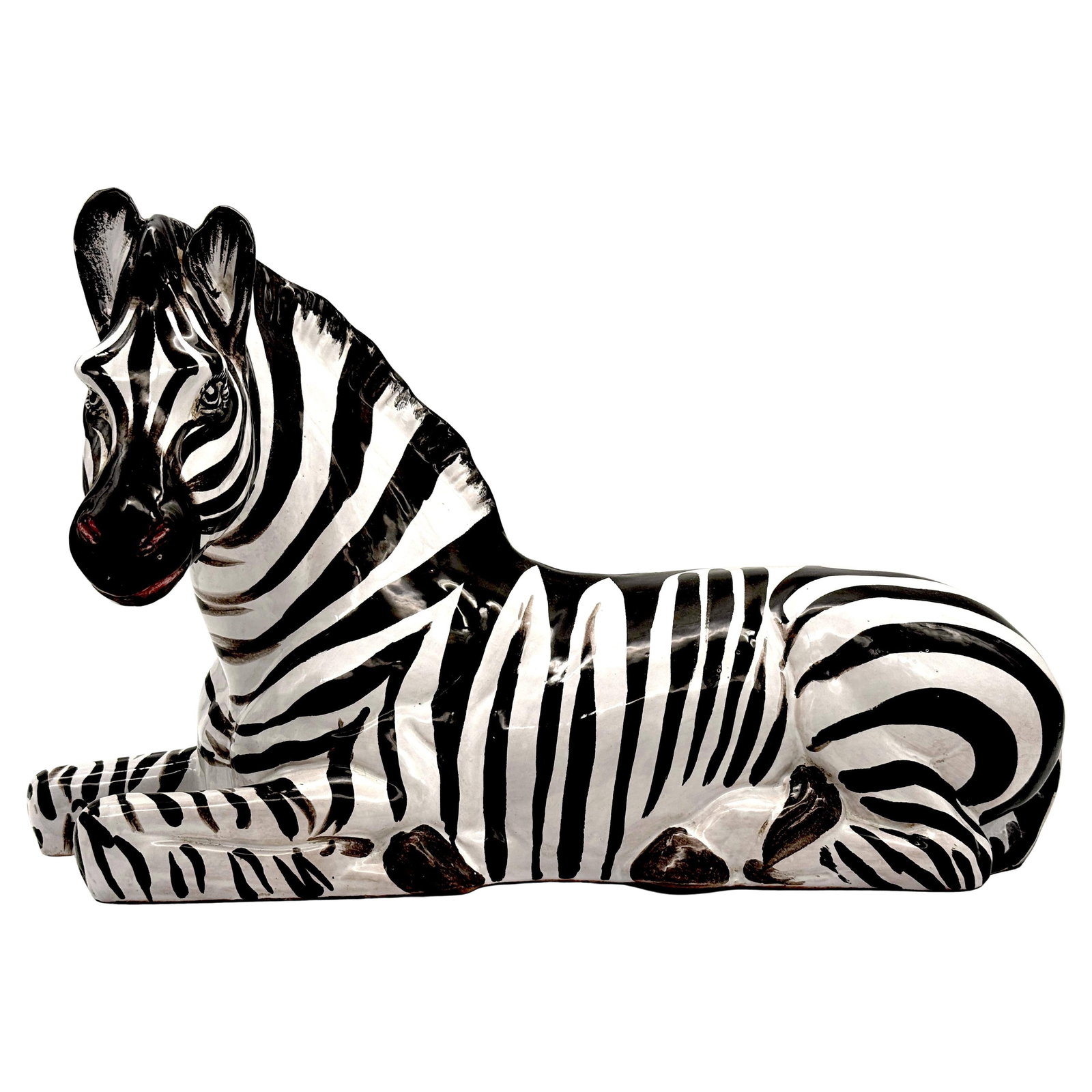 Handcrafted Italian Porcelain Zebra Figure Mid-Century Modern 1970s: Handcrafted Italian Porcelain Zebra Figure Mid-Century Modern 1970s This Italian mid-century porcelain sculpture features a seated zebra, crafted in the 1970s. Meticulously hand-crafted and hand-paint