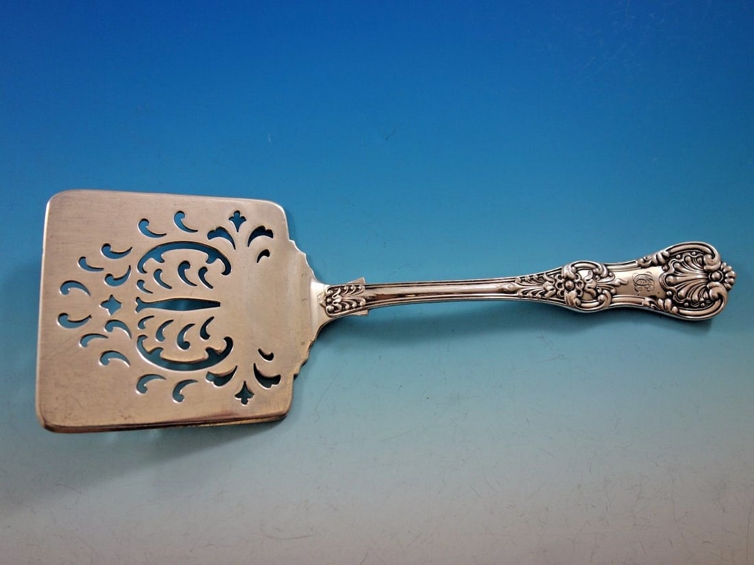 Tiffany & Co English King Sterling Silver Waffle Server Scallop Piercings: Tiffany & Co English King Sterling Silver Waffle Server Scallop Piercings Presenting a beautifully crafted Sterling Silver Waffle Server from the renowned English King pattern by Tiffany & Co. This ex