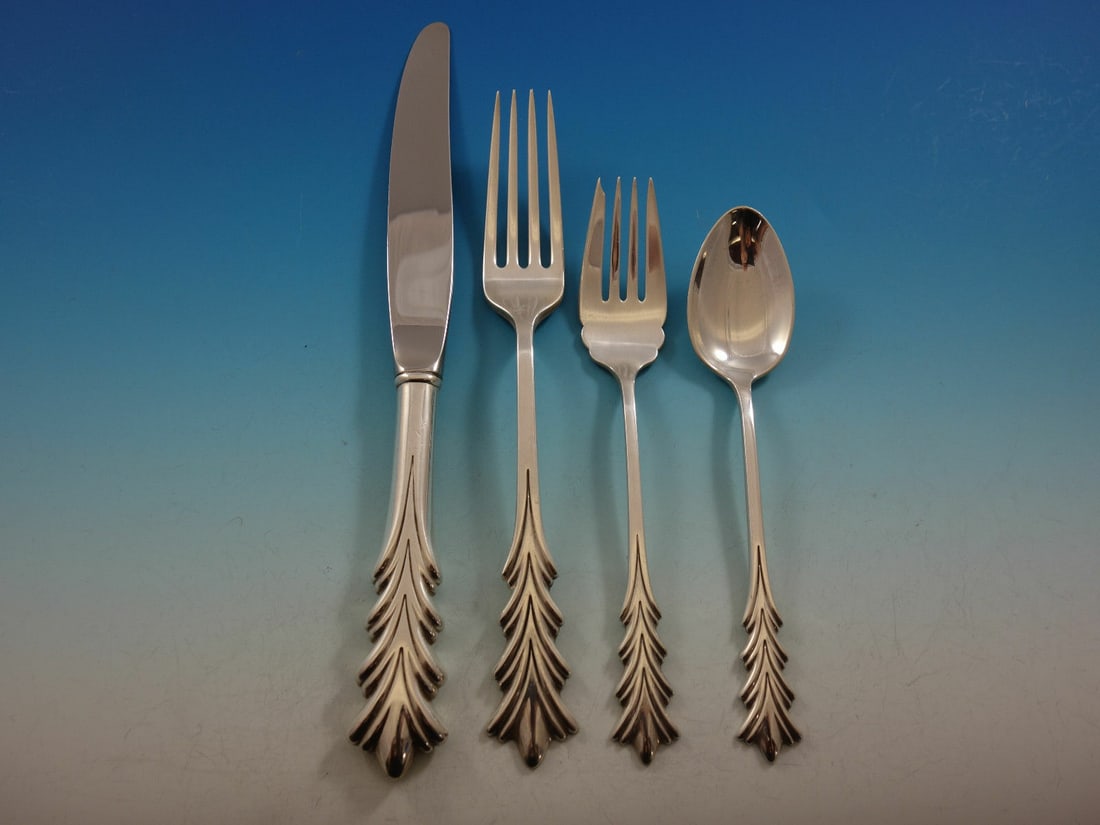 Tuttle Crest of Arden Sterling Silver 4-Piece Dinner Place Setting: Tuttle Crest of Arden Sterling Silver 4-Piece Dinner Place Setting Enhance your dining experience with this elegant 4-piece dinner size place setting from Tuttle, featuring the exquisite Crest of Arde