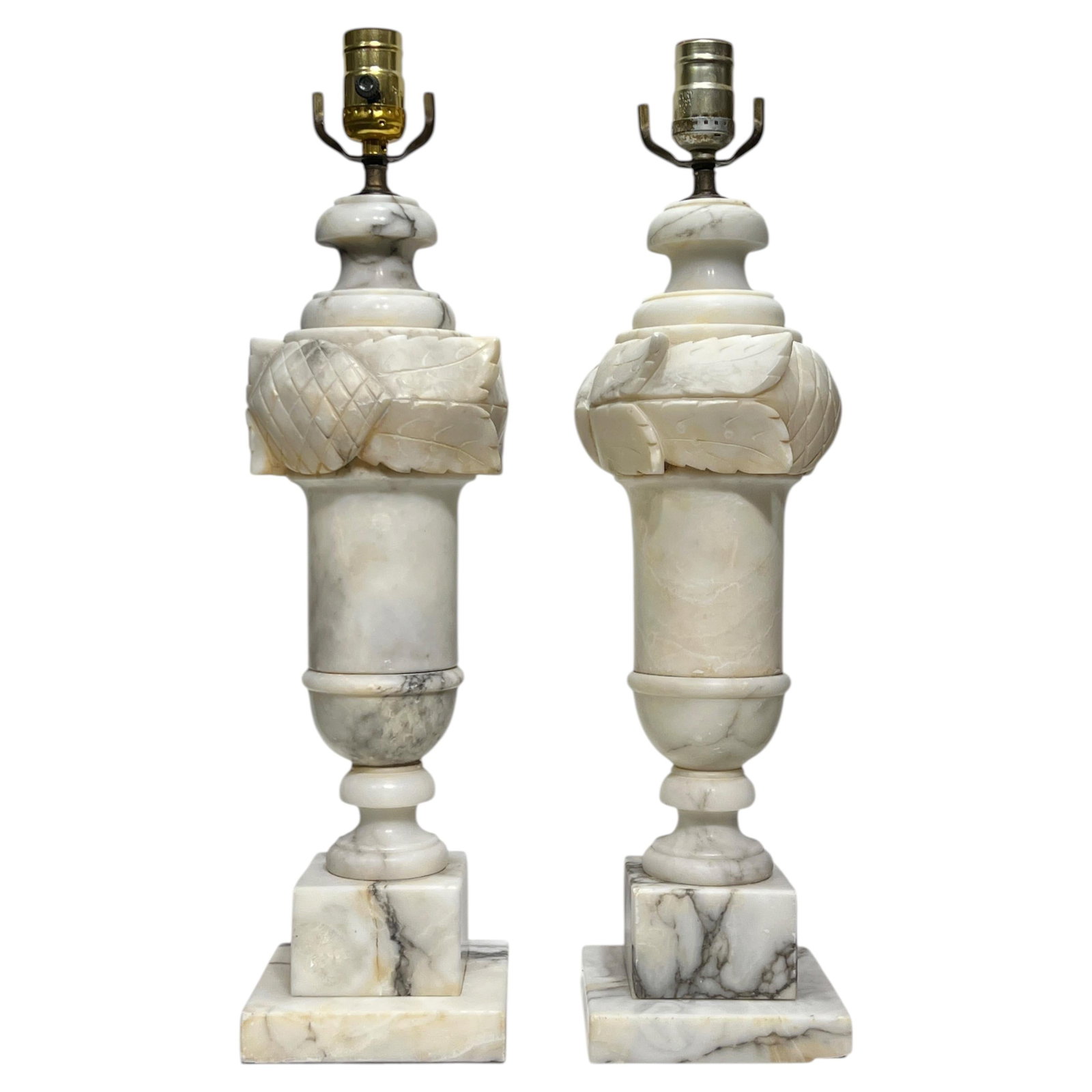 Set of Two Italian Alabaster Neoclassical Table Lamps Early 20th Century: Set of Two Italian Alabaster Neoclassical Table Lamps Early 20th Century This pair of Italian Neoclassical table lamps dates to the early 20th century and is finely hand-carved from alabaster stone. E