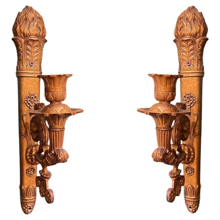 Set of 2 French Empire Revival Torch Motif Metal Wall Sconces: Set of 2 French Empire Revival Torch Motif Metal Wall Sconces This pair of antique French Empire style wall sconces dates to the early 20th century and features a neoclassical design with backplates s