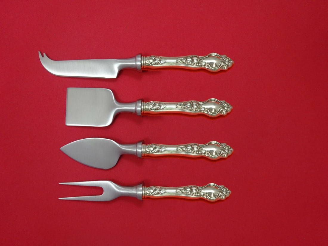Violet by Wallace Sterling Silver 4pc Cheese Serving Set Custom Made: Violet by Wallace Sterling Silver 4pc Cheese Serving Set Custom Made Elevate your cheese serving experience with this exquisite 4-piece cheese serving set, crafted in the elegant Violet pattern by Wal