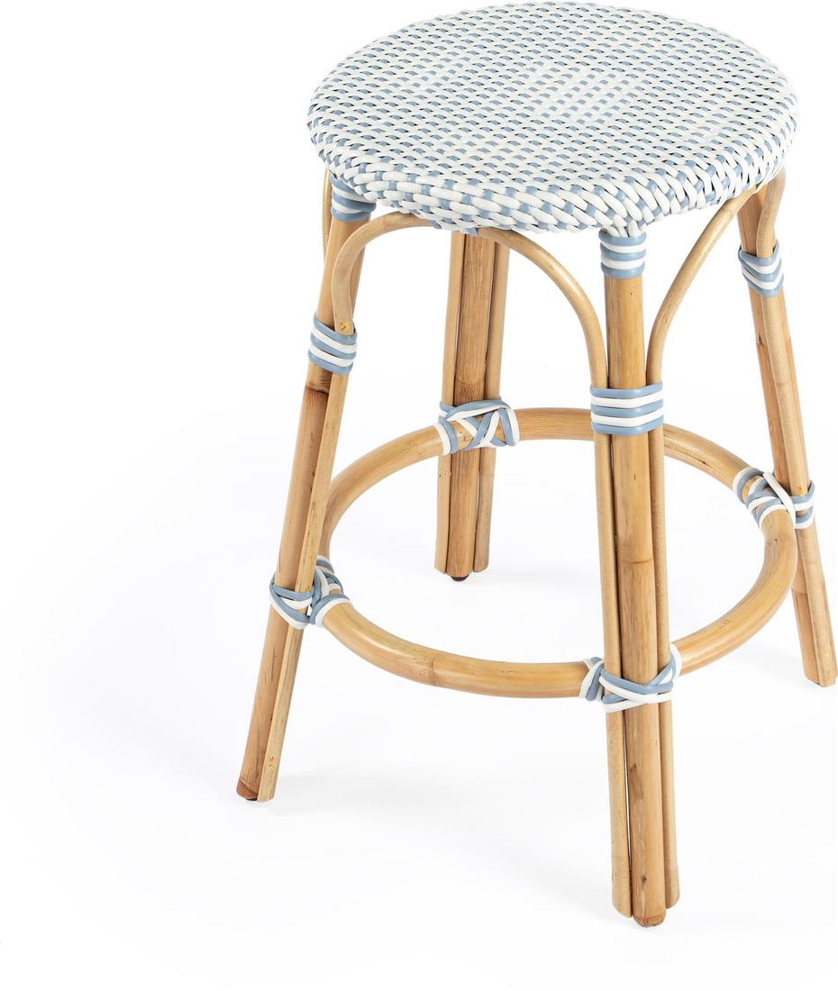 Butler Coastal Rattan Counter Stool Natural Blue 24H Round: Butler Coastal Rattan Counter Stool Natural Blue 24H Round Introducing the Elegant Coastal Rattan Stool, a perfect addition to your coastal-themed decor. This stylish counter stool features a natural 