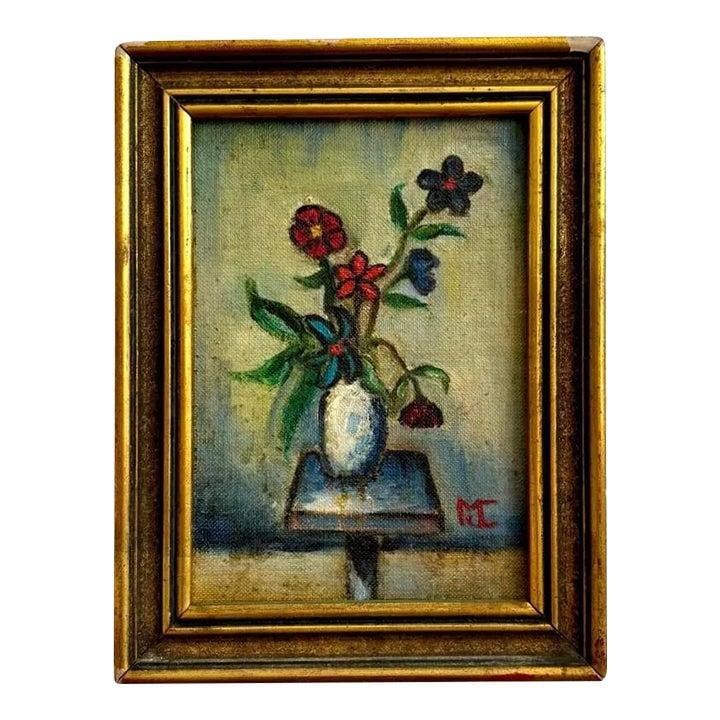 Floral Still Life Oil Painting Framed in Vintage Gold: Floral Still Life Oil Painting Framed in Vintage Gold This vintage boho floral oil painting features a small still life of vibrant blossoms arranged in a vase on a narrow table. Executed in a loose, e