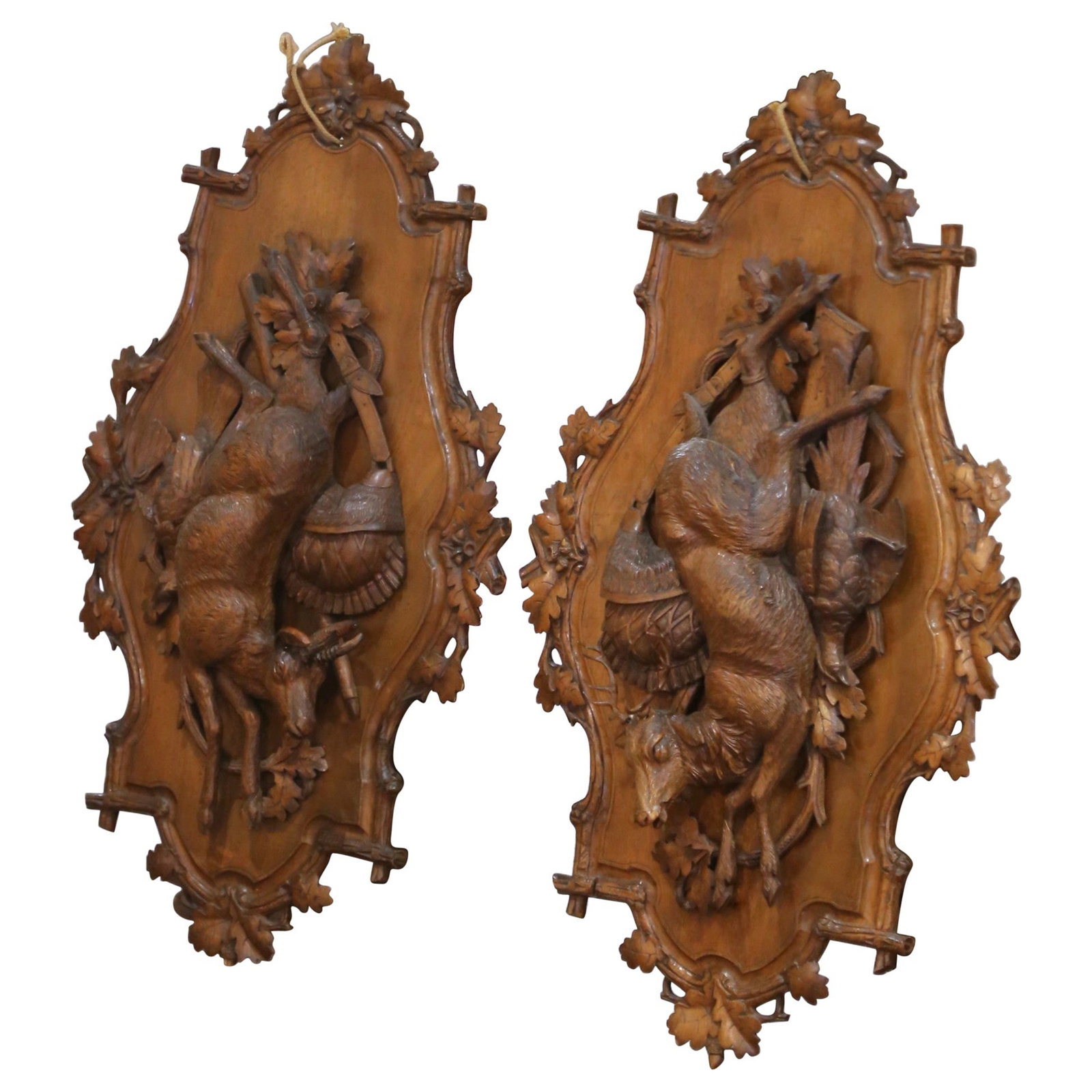19th Century Swiss Black Forest Carved Walnut Hunt Trophy Set of 2: 19th Century Swiss Black Forest Carved Walnut Hunt Trophy Set of 2 This exquisite pair of 19th Century Swiss Black Forest carved walnut hunt trophy sculptures showcases the exceptional craftsmanship o