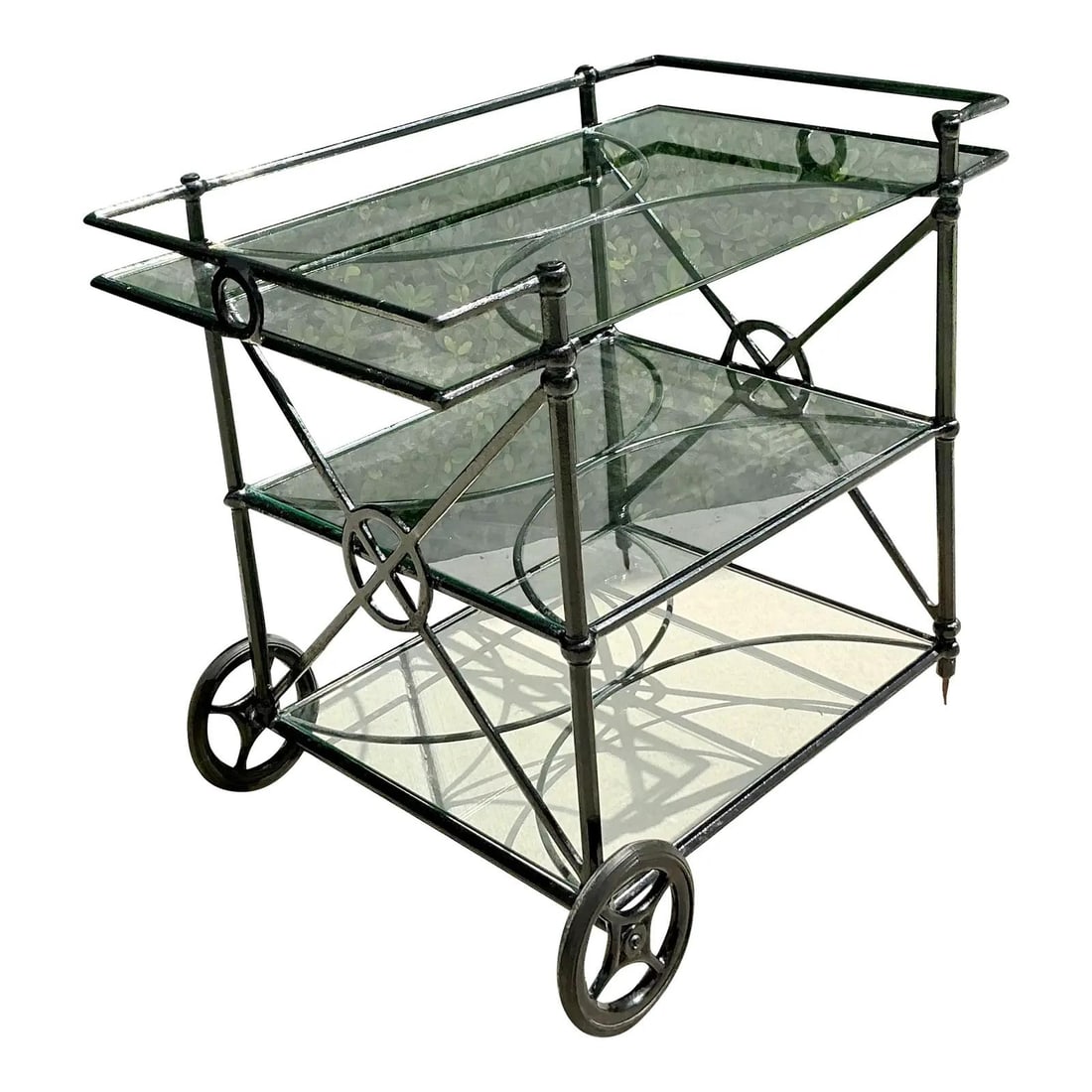 Hollywood Regency Black Wrought Iron and Glass Bar Cart from Target: Hollywood Regency Black Wrought Iron and Glass Bar Cart from Target This vintage Hollywood Regency dry bar features a black wrought iron frame with intricate scrollwork and two tiers of clear glass sh