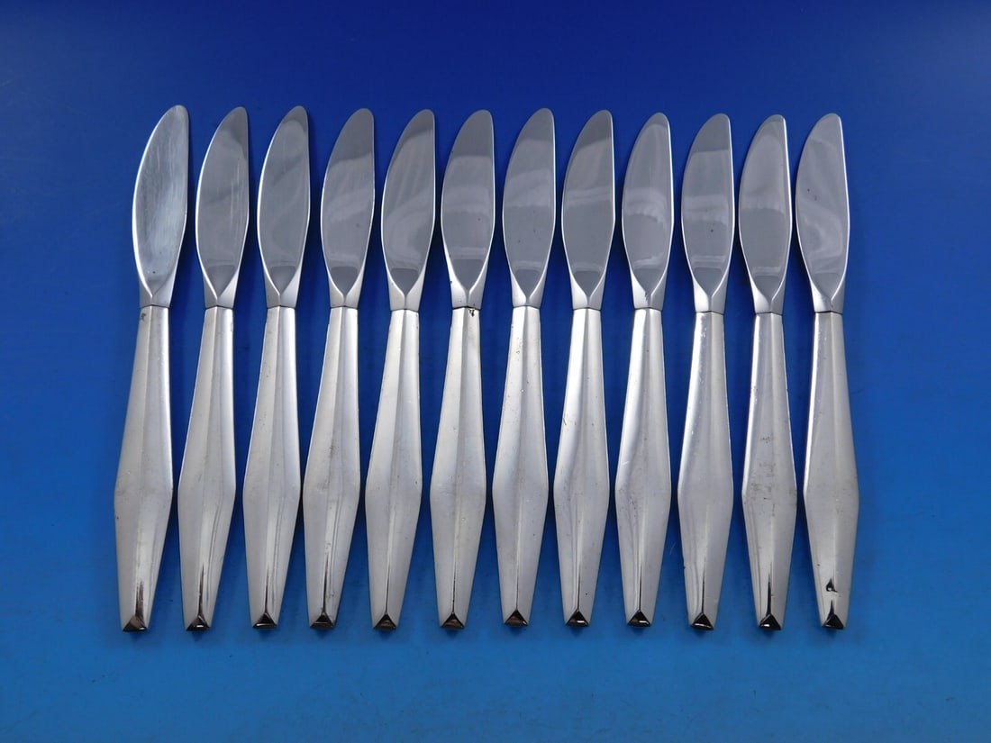 Reed and Barton Diamond Sterling Silver Butter Spreaders Set of 12: Reed and Barton Diamond Sterling Silver Butter Spreaders Set of 12 Enhance your dining experience with this exquisite set of 12 butter spreaders from Reed and Barton, featuring the elegant Diamond pat