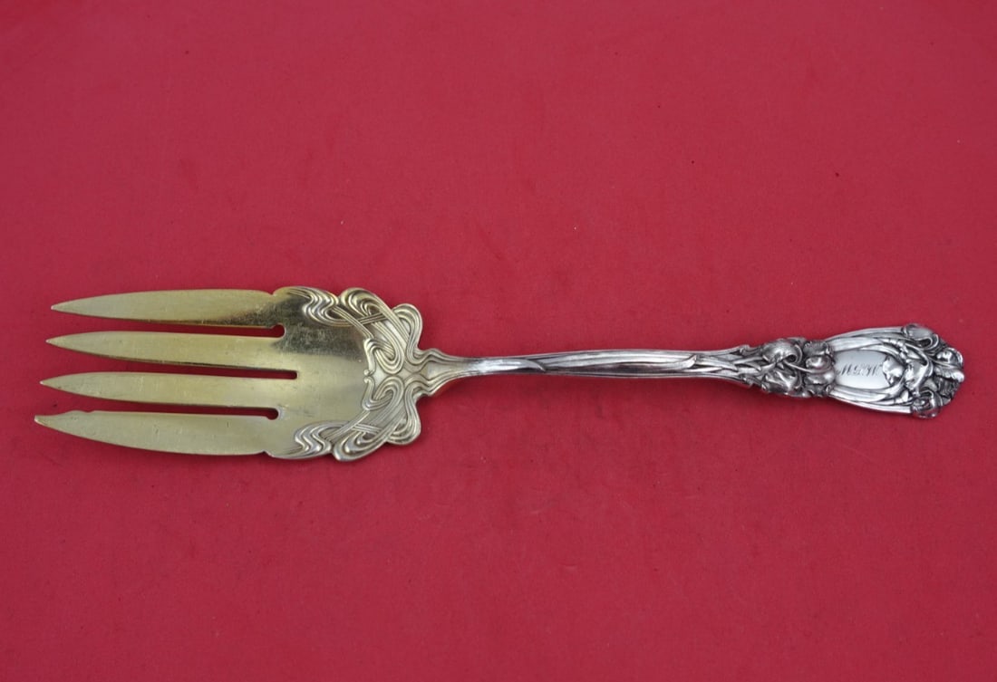 Durgin-Gorham Iris Sterling Silver Cold Meat Fork Gold Washed 9.25": Durgin-Gorham Iris Sterling Silver Cold Meat Fork Gold Washed 9.25" This exquisite Iris cold meat fork, crafted by Durgin-Gorham, is a stunning example of fine sterling silverware. Measuring 9 1/4 inc