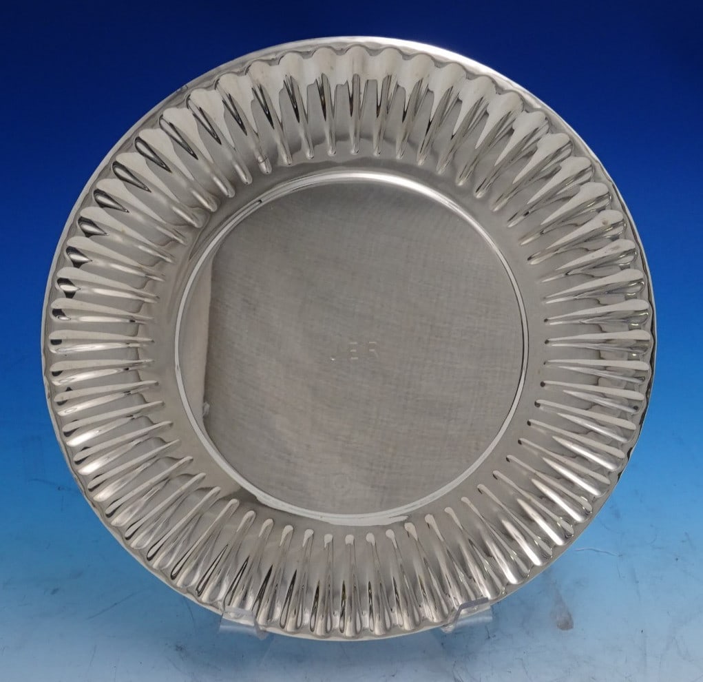 Tiffany & Co Sterling Silver Paper Plate Monogrammed 8.5": Tiffany & Co Sterling Silver Paper Plate Monogrammed 8.5" Elevate your dining experience with this exquisite Tiffany & Co. sterling silver plate, crafted in a unique paper plate style. Made in Italy, 