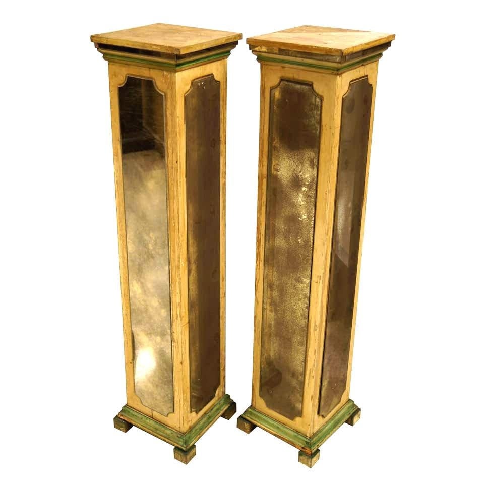 Set of Two Mirrored Glass Pedestal Stands in Style of Maison Jansen: Set of Two Mirrored Glass Pedestal Stands in Style of Maison Jansen This exquisite pair of mirrored pedestal stands, crafted in the style of Maison Jansen, showcases a square form with mirrored panels