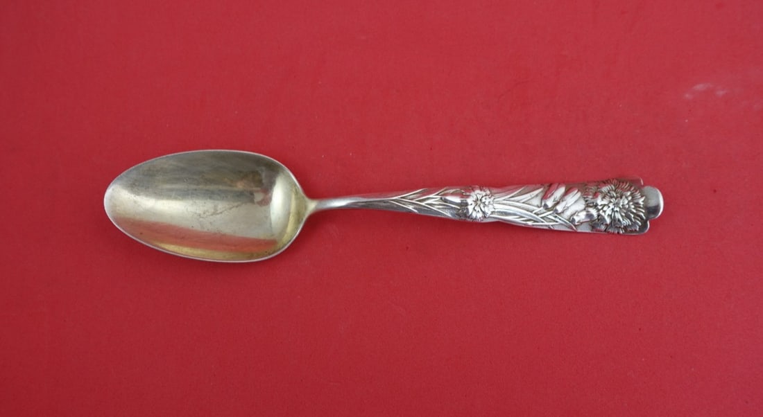 Sterling Silver Soup Spoon Flora Pattern by Shiebler with Carnation Motif 7 Inch: Sterling Silver Soup Spoon Flora Pattern by Shiebler with Carnation Motif 7 Inch This is a sterling silver place soup spoon in the Flora pattern by Shiebler, featuring a decorative carnation motif. Th
