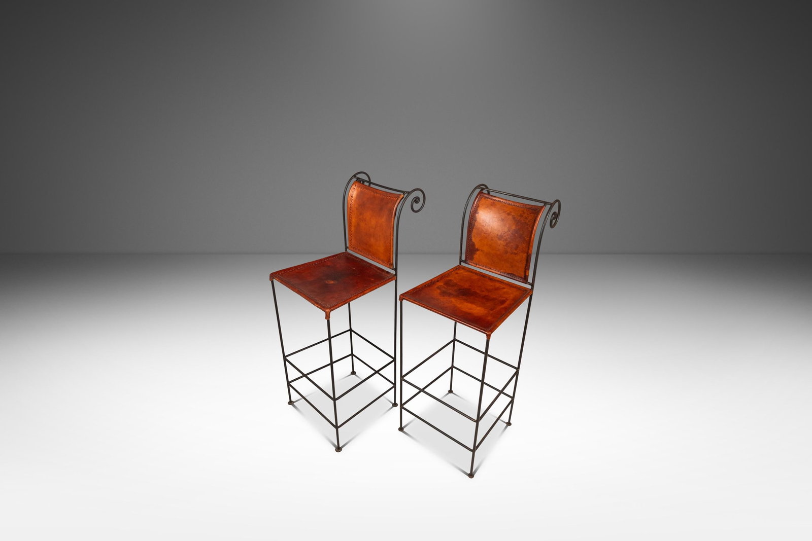 Spanish Hacienda Barstool Set of Two Wrought Iron Leather 1960s: Spanish Hacienda Barstool Set of Two Wrought Iron Leather 1960s Enhance your space with this stunning set of two counter height barstools, crafted from wrought iron and upholstered in hand-worked full