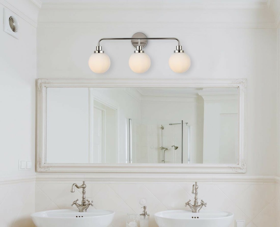 Hanson Modern 3-Light Wall Sconce With Polished Nickel And Frosted Glass: Hanson Modern 3-Light Wall Sconce With Polished Nickel And Frosted Glass This modern wall sconce features three lights with a polished nickel finish and frosted glass shades. Its sleek design is ideal