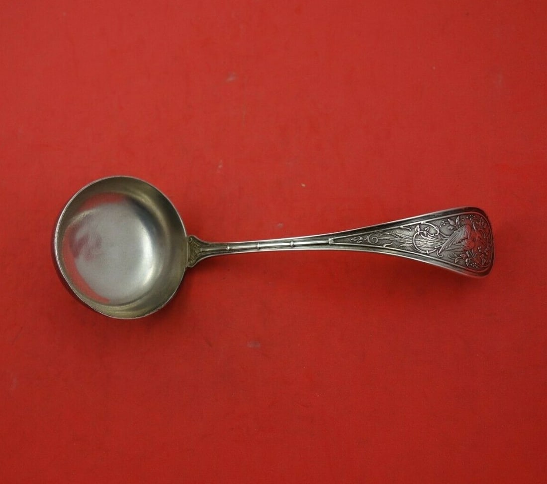 Wendt Sterling Silver 7 Inch Gravy Ladle Bird Pattern Multi Motif: Wendt Sterling Silver 7 Inch Gravy Ladle Bird Pattern Multi Motif This exquisite gravy ladle is crafted by Wendt in sterling silver, showcasing a plain bowl design and measuring 7 inches in length. Th