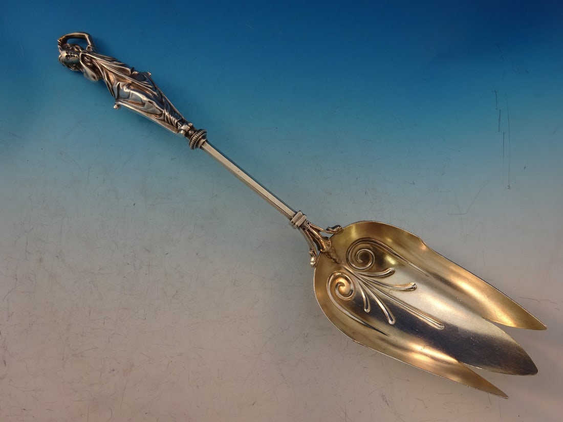 Wood & Hughes Art Silver Serving Fork 12 1/8" Circa 1860-1883: Wood & Hughes Art Silver Serving Fork 12 1/8" Circa 1860-1883 This exquisite buffet fork, crafted by Wood & Hughes, showcases the Art Silver pattern from circa 1860-1883. Made from high-quality sterli
