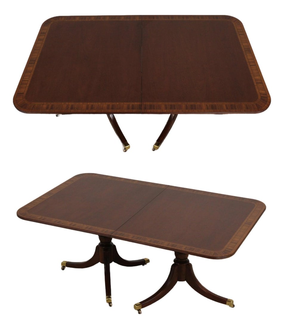 Mahogany Double Pedestal Dining Table with Inlaid Banded Top and Brass Accents: Mahogany Double Pedestal Dining Table with Inlaid Banded Top and Brass Accents This mahogany double pedestal dining table features a traditional design with a rich, high sheen finish and a reeded edge