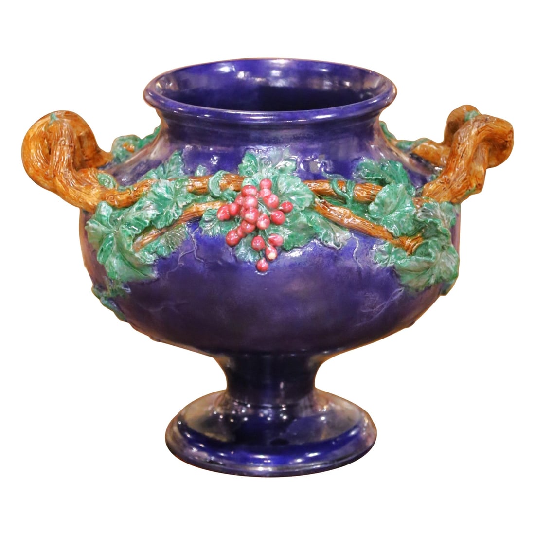 French Barbotine Terracotta Pedestal Urn Signed MI de Sevres Dated 1858: French Barbotine Terracotta Pedestal Urn Signed MI de Sevres Dated 1858 This mid-19th century French barbotine terracotta urn, signed and dated 1858, showcases a richly glazed cobalt blue ground adorn