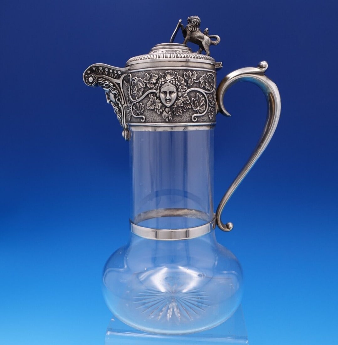 Victorian Sterling Silver Claret Wine Decanter by J Grinsell & Sons: Victorian Sterling Silver Claret Wine Decanter by J Grinsell & Sons Introducing an exquisite Victorian claret wine decanter pitcher by John Grinsell & Sons, crafted in Birmingham circa 1890. This rema