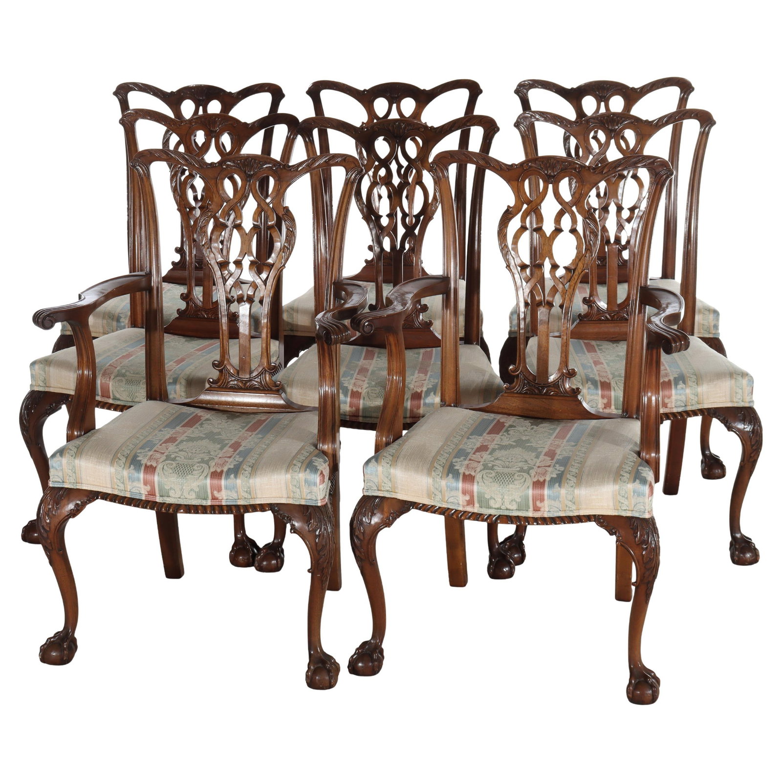 Set of Eight 1920s Mahogany Chippendale Carved Dining Chairs with Armchairs: Set of Eight 1920s Mahogany Chippendale Carved Dining Chairs with Armchairs This set of eight antique dining chairs, crafted in the Chippendale style around 1920, features solid mahogany construction 