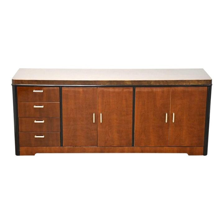 Henredon Modern Walnut Credenza with Adjustable Shelving: Henredon Modern Walnut Credenza with Adjustable Shelving This contemporary credenza by Henredon features a rich walnut finish and offers ample storage with adjustable shelving. With dimensions of 72.5