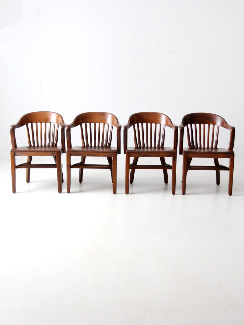 Set of 4 Antique Bankers Chairs Classic Office Armchairs: Set of 4 Antique Bankers Chairs Classic Office Armchairs This set of four antique bankers chairs dates back to the early 20th century, originally utilized in libraries. Known as office armchairs or ca