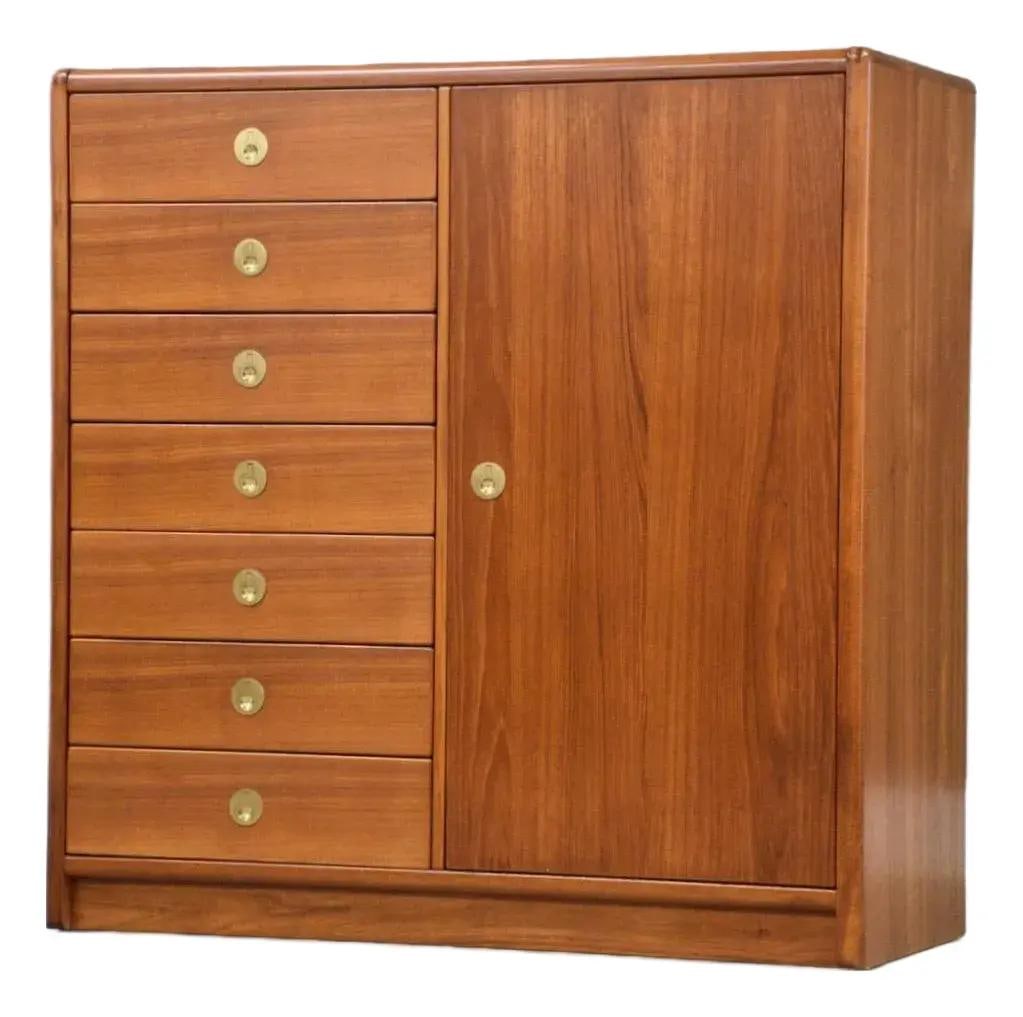 Mid Century Danish Modern Teak Armoire Dresser with Brass Pulls: Mid Century Danish Modern Teak Armoire Dresser with Brass Pulls This exquisite mid-century modern teak armoire dresser showcases a timeless design with elegant brass drawer pulls. Crafted in Singapore