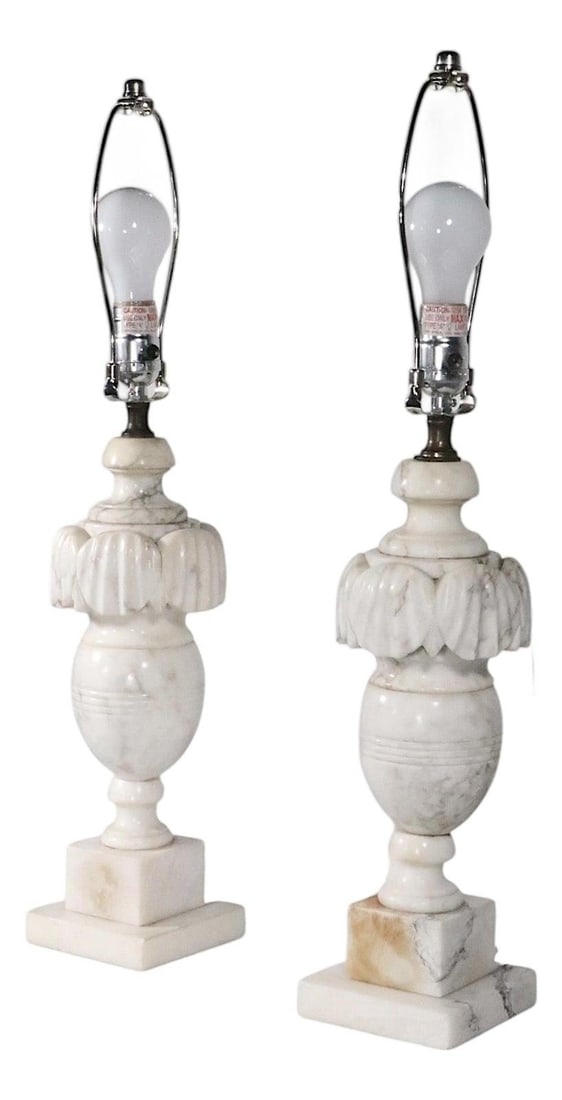 Pair of Italian Carved Marble Neoclassical Table Lamps Circa 1940s-60s: Pair of Italian Carved Marble Neoclassical Table Lamps Circa 1940s-60s This pair of mid-20th century Neo-Classical table lamps features carved marble bases and was crafted in Italy circa 1940 to 1960.