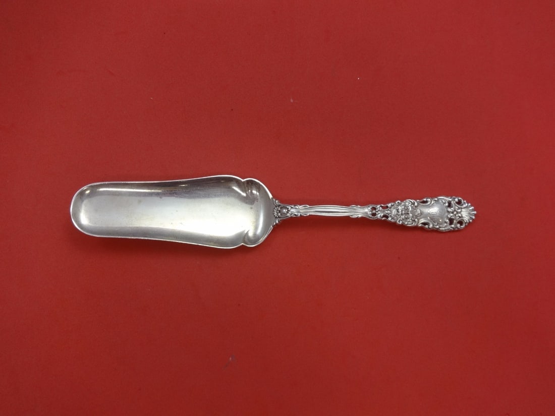 Dominick & Haff Renaissance Sterling Silver Jelly Cake Trowel 7 3/4": Dominick & Haff Renaissance Sterling Silver Jelly Cake Trowel 7 3/4" This exquisite 7 3/4" jelly cake trowel is crafted from high-quality sterling silver in the elegant Renaissance pattern by Dominick