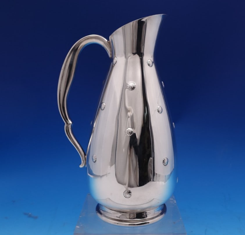 Reed & Barton Far East Sterling Silver Water Pitcher 18.1oz: Reed & Barton Far East Sterling Silver Water Pitcher 18.1oz Introducing the exquisite Far East water pitcher by Reed and Barton, crafted from high-quality sterling silver (.925). This stunning pitcher