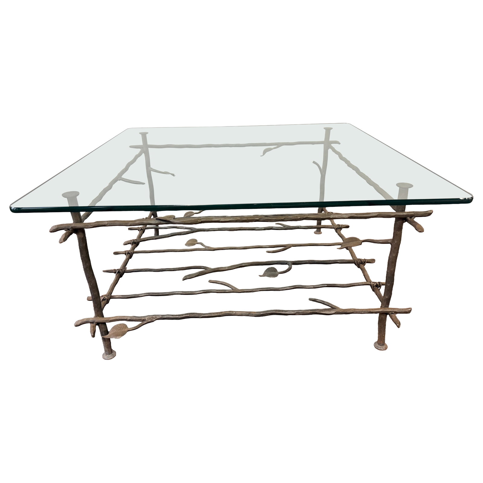 Forged Iron Coffee Table with Glass Top in Giacometti Style Vine Trellis Base: Forged Iron Coffee Table with Glass Top in Giacometti Style Vine Trellis Base This coffee table is crafted in the style of Alberto and Diego Giacometti, featuring a sculptural forged iron base inspire