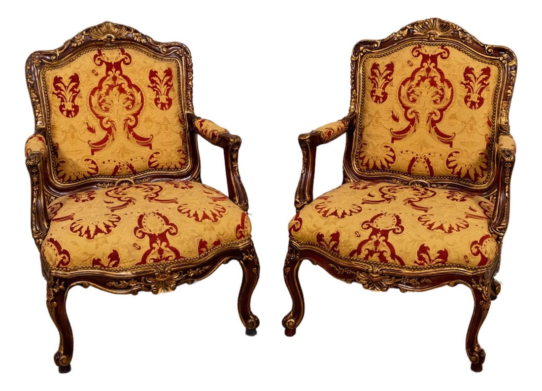 Set of 2 Mahogany French Style Armchairs with Ornate Carving: Set of 2 Mahogany French Style Armchairs with Ornate Carving This pair of Southwood Louis XV style fauteuil armchairs features finely carved mahogany frames with ornate carvings highlighted by gold pa