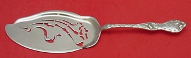 Reed and Barton Les Cinq Fleurs Sterling Silver Fish Server 11 5/8": Reed and Barton Les Cinq Fleurs Sterling Silver Fish Server 11 5/8" This exquisite fish server is crafted by Reed and Barton from sterling silver, featuring the elegant Les Cinq Fleurs pattern. Measur
