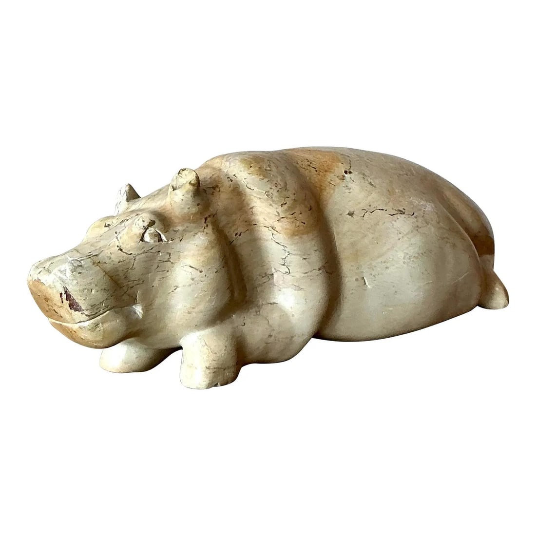 Mid Century Carved Stone Hippopotamus Sculpture in Organic Modern Style: Mid Century Carved Stone Hippopotamus Sculpture in Organic Modern Style This vintage carved stone hippo sculpture showcases the robust form of a resting hippopotamus, crafted from a single piece of na