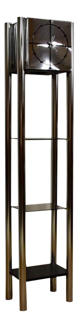 1970s Modern Chrome Clock with Glass Shelves: 1970s Modern Chrome Clock with Glass Shelves This striking 1970s modern chrome clock features a sleek design with four cylindrical posts, two glass shelves, and a minimalist black face. Perfect for ad