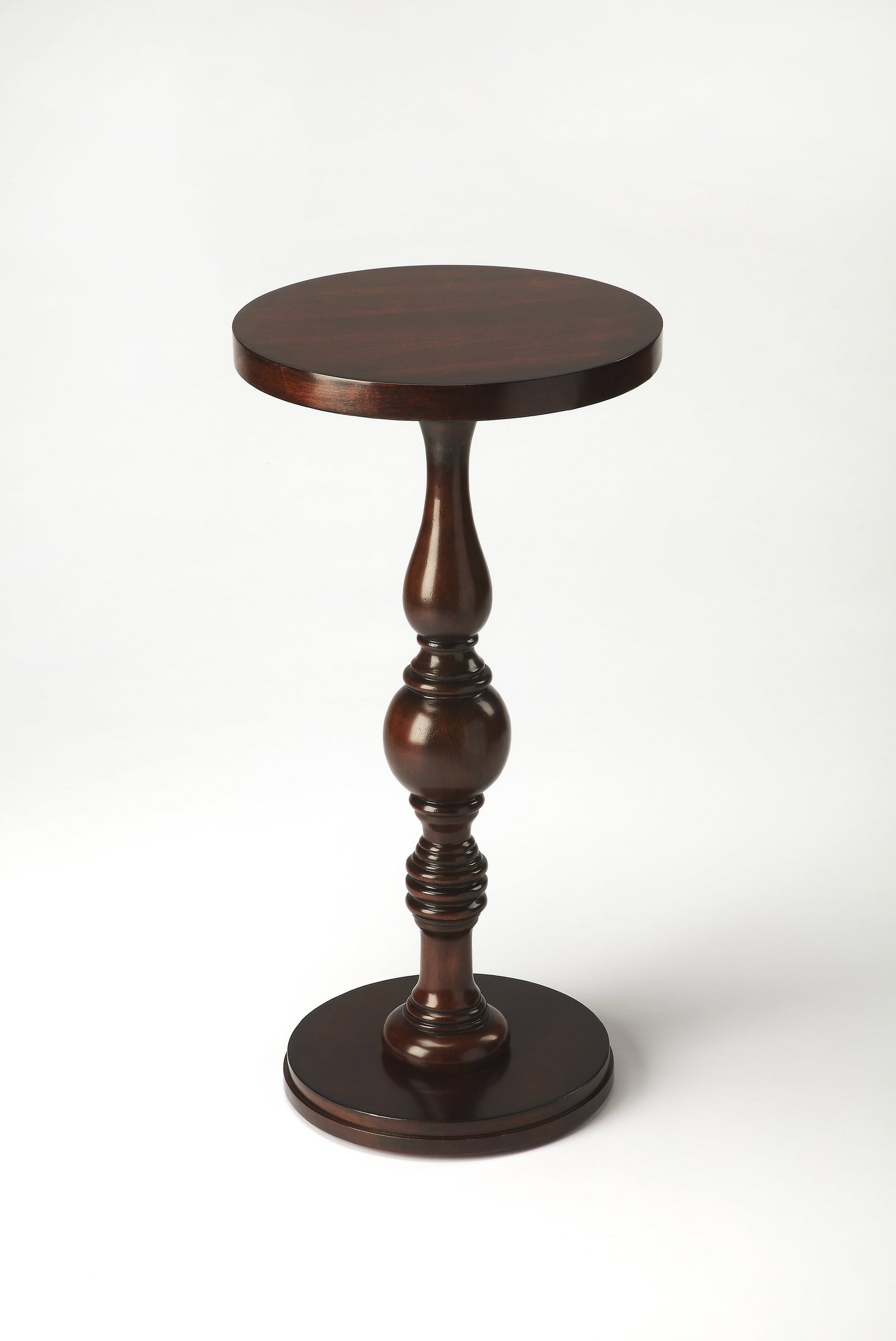 Butler Camilla Round Side Table in Dark Brown Cherry Finish: Butler Camilla Round Side Table in Dark Brown Cherry Finish Enhance your living space with the Traditional Cherry Camilla Side Table, a perfect blend of style and functionality. This elegantly designe