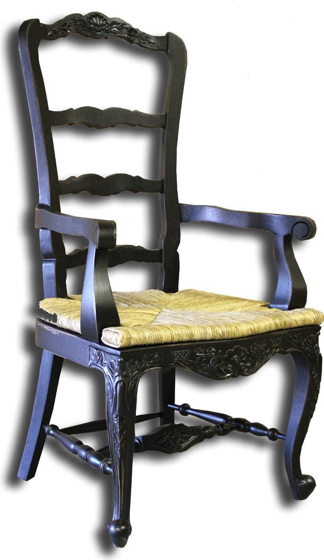 Elegant Country French Arm Chair with Intricate Carvings in Antiqued Blackwash: Elegant Country French Arm Chair with Intricate Carvings in Antiqued Blackwash Introducing the Elegant Dining Arm Chair, a stunning piece that combines vintage charm with modern craftsmanship. This ta