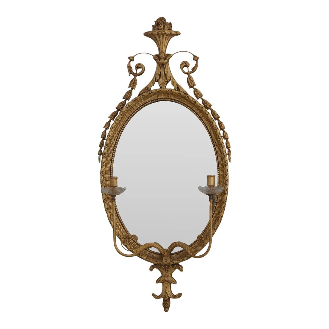 Traditional Gold Beveled Mirror with Crystal Candelabra and Flame Urn Top: Traditional Gold Beveled Mirror with Crystal Candelabra and Flame Urn Top This traditional style mirror features a gold frame with a flame urn top and crystal candelabra cups. The beveled mirror adds 