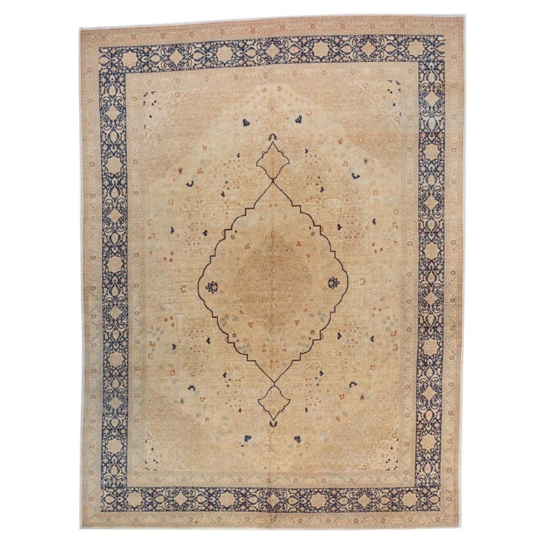 Antique Persian Hadji Jal Li Tabriz Rug 107 x 144 Wool Hand-Woven: Antique Persian Hadji Jal Li Tabriz Rug 107 x 144 Wool Hand-Woven Discover the timeless elegance of this magnificent early 20th century antique Persian Hadji Jal Li Tabriz rug. Hand-woven from high-qu
