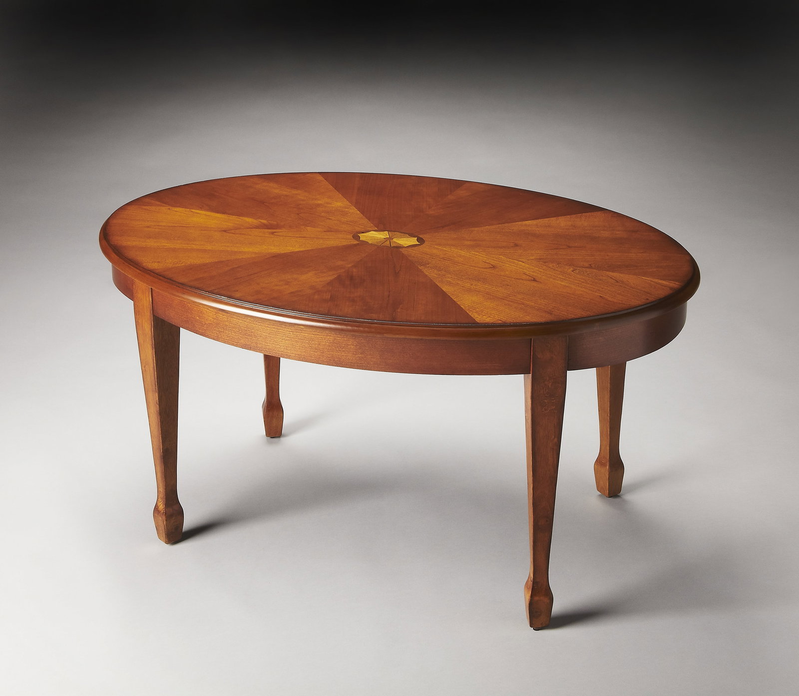 Butler Clayton Oval Olive Ash Burl Cocktail Table: Butler Clayton Oval Olive Ash Burl Cocktail Table This Elegant Olive Ash Burl Cocktail Table features a stunning design with a rich Olive Ash Brown finish, adding sophistication to any living space. C