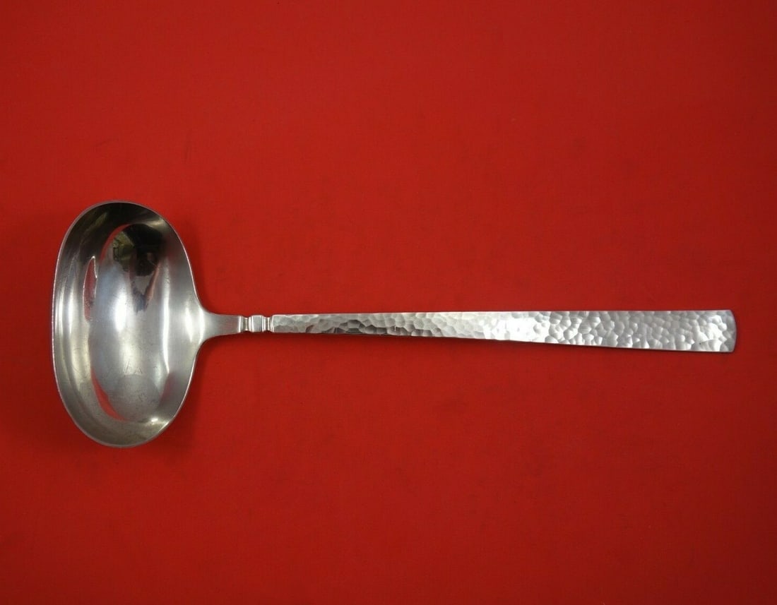 Danica Rustic Hammered Sterling Silver Soup Ladle 12 Inch: Danica Rustic Hammered Sterling Silver Soup Ladle 12 Inch This exquisite soup ladle from Danica showcases a rustic hammered design, perfect for adding charm to your table setting. Crafted from high-qu