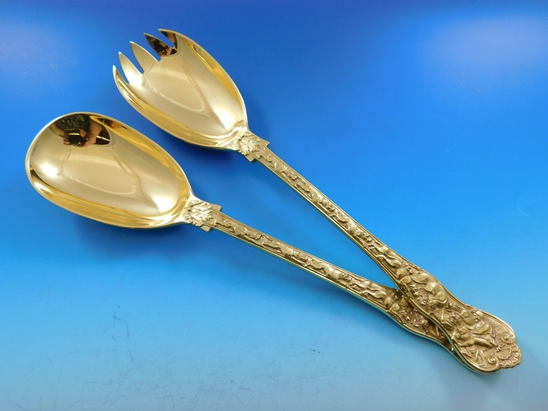 CJ Vander Stag Hunt Sterling Silver Salad Serving Set 2pc Vermeil Finish: CJ Vander Stag Hunt Sterling Silver Salad Serving Set 2pc Vermeil Finish Enhance your dining experience with this exquisite Stag Hunt Salad Serving Set by CJ Vander. This elegant 2-piece set includes 