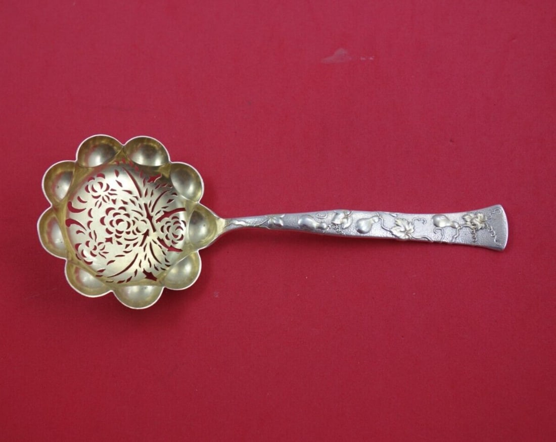Tiffany & Co. Vine Sterling Silver Sugar Sifter 6.25in Gourd Motif: Tiffany & Co. Vine Sterling Silver Sugar Sifter 6.25in Gourd Motif Elevate your dining experience with this exquisite Sterling Silver Sugar Sifter from Tiffany & Co.'s Vine collection. Crafted in the 