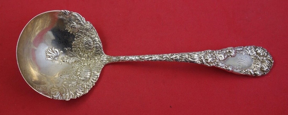 Durgin Chrysanthemum Sterling Silver Gravy Ladle 7 7/8 inches: Durgin Chrysanthemum Sterling Silver Gravy Ladle 7 7/8 inches This exquisite gravy ladle is crafted in sterling silver and features the elegant Chrysanthemum pattern by Durgin. Measuring a generous 7 