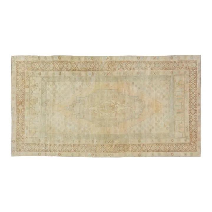 3'8" x 7'4" Anatolian Wool Rug Hand Knotted Vintage: 3'8" x 7'4" Anatolian Wool Rug Hand Knotted Vintage This vintage Turkish Anatolian rug is hand-knotted from wool, showcasing traditional craftsmanship with a modern design sensibility. Its rich textur