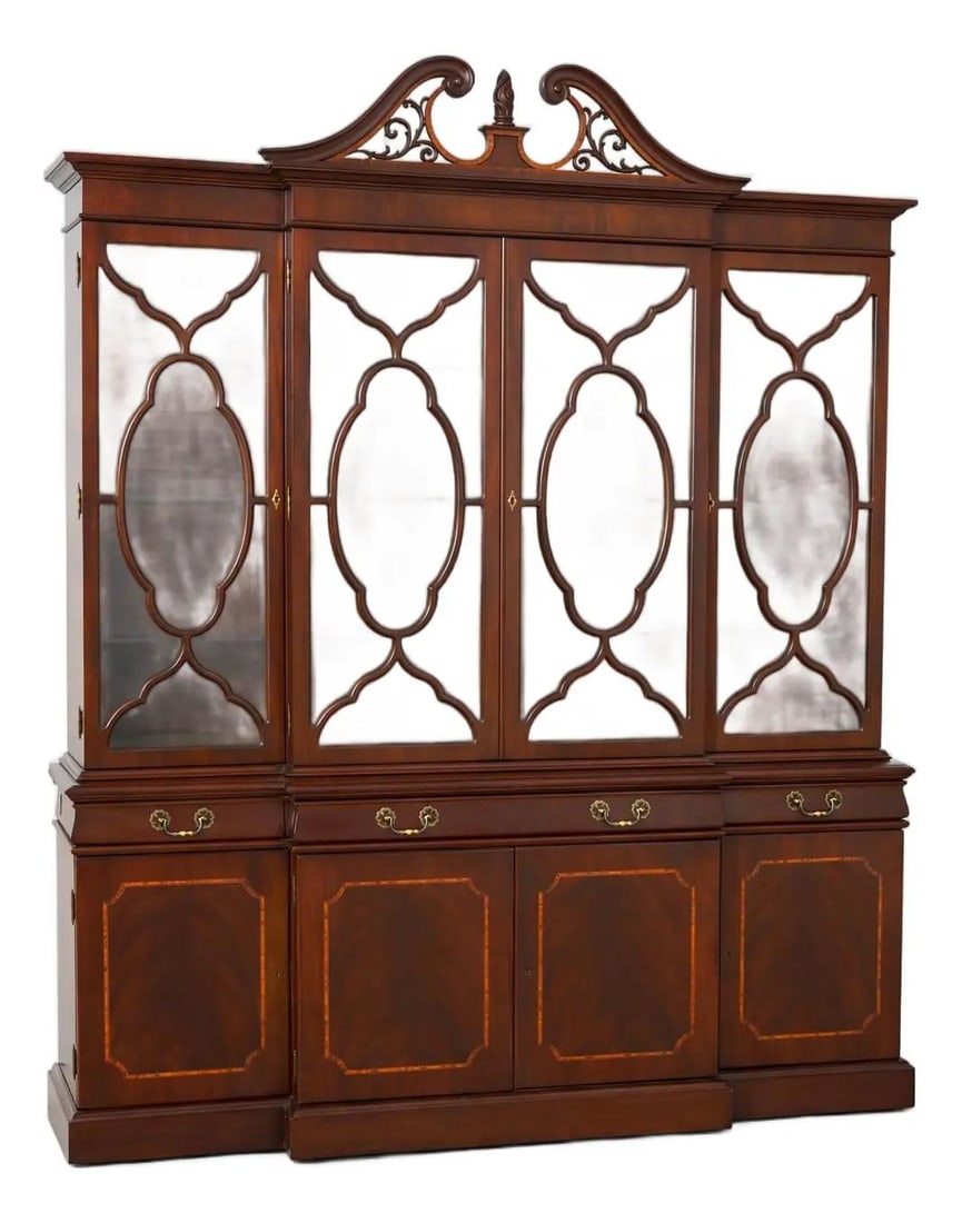 Mahogany China Cabinet with Four Doors and Glass Shelves by Karges: Mahogany China Cabinet with Four Doors and Glass Shelves by Karges This Karges breakfront china cabinet features four individual pane glass doors, a pierced pediment top with a flame twist finial, and
