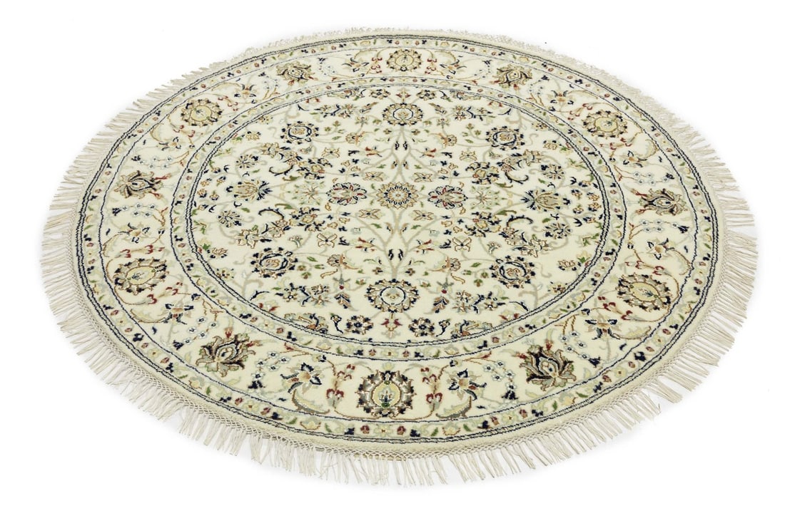 Hand-Knotted Indo-Nain Round Wool Silk Rug 4'11 x 4'11 Floral Design: Hand-Knotted Indo-Nain Round Wool Silk Rug 4'11 x 4'11 Floral Design This round hand-knotted rug features a classic floral pattern with modern influences. Crafted in India from a blend of wool and sil