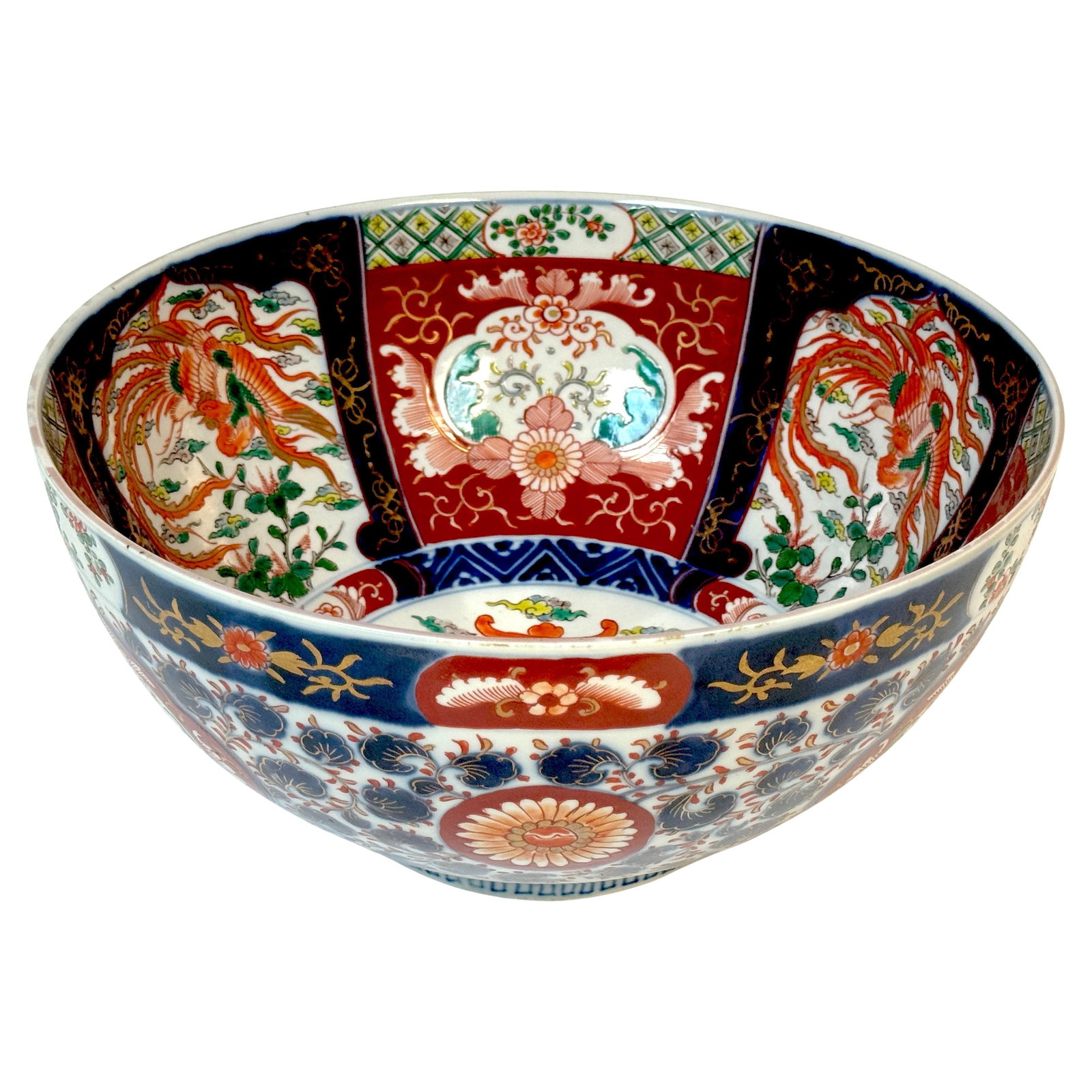 Meiji Imari Large Bowl Phoenix Floral Motifs Attributed Fukagawa: Meiji Imari Large Bowl Phoenix Floral Motifs Attributed Fukagawa This exquisite large Meiji Imari center bowl, attributed to Fukagawa, showcases stunning phoenix and floral motifs. Crafted from fine p