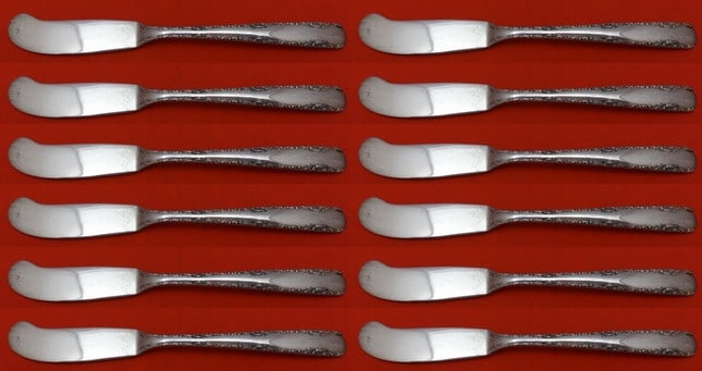 Gorham Camellia Sterling Silver Butter Spreaders Set of 12: Gorham Camellia Sterling Silver Butter Spreaders Set of 12 Add elegance to your dining experience with this stunning 12-piece set of butter spreaders in the Camellia pattern by Gorham. Crafted from hi