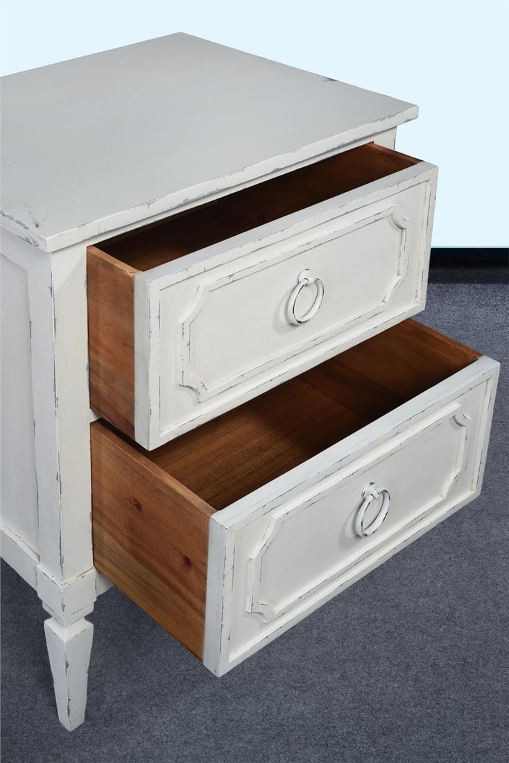 Helena White Nightstand 32H 24W 18D: Helena White Nightstand 32H 24W 18D Introducing a beautifully crafted nightstand designed in a timeless antique style, perfect for adding a touch of vintage elegance to any bedroom decor. This piece f