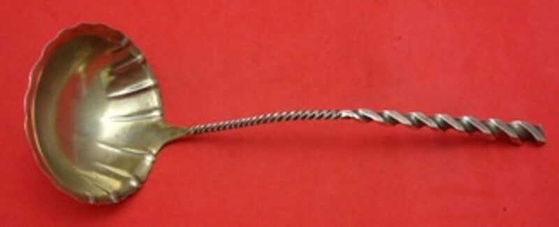 Whiting Square Twist #5 Sterling Silver Gold Washed Oyster Ladle 11": Whiting Square Twist #5 Sterling Silver Gold Washed Oyster Ladle 11" Serve your seafood dishes with elegance using this exquisite Square Twist #5 Oyster Ladle by Whiting. Crafted from fine sterling si